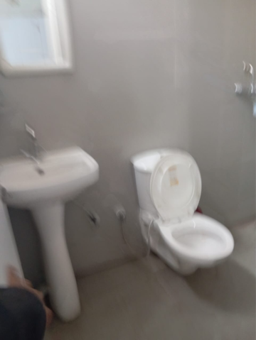 Bathroom in 3 BHK Apartment at Dhakoli Village – for Sale
