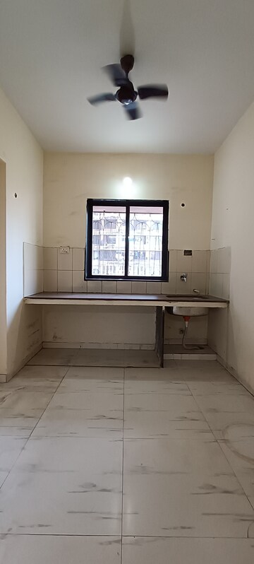 Kitchen in 3 BHK Apartment at Royal Palms Garden View, Goregaon East – for Sale