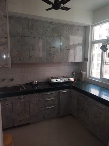 Kitchen in 2 BHK Apartment at Shree Vardhman Green Court, Sector 90 – for Sale