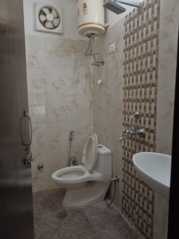 Bathroom in 2 BHK Builder Floor at Chattarpur – for Sale