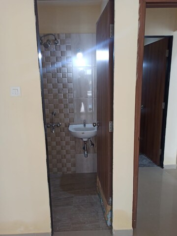Bathroom in 1 BHK Apartment at Man Opus, Mira Road – for Sale