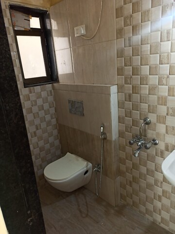 Bathroom in 1 BHK Apartment at Man Opus, Mira Road – for Sale