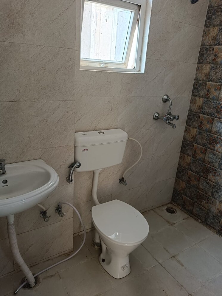 Bathroom, signature-global-the-millennia 2 Bedroom 710 Sq.Ft. Apartment In Sector 37d Gurgaon 7415441