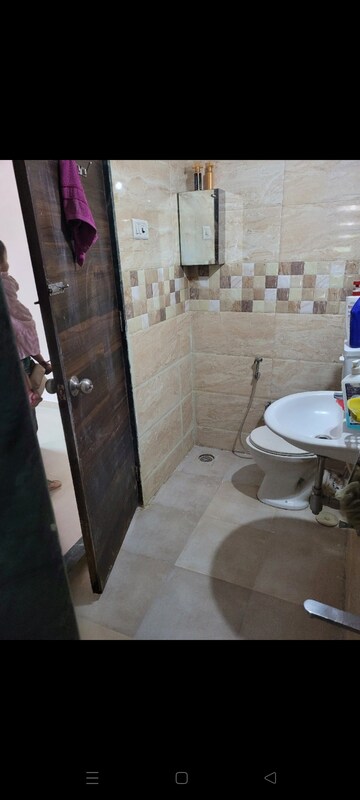 Bathroom in 2 BHK Apartment at Mahavir Kalpavruksha, Ghodbunder Road – for Sale