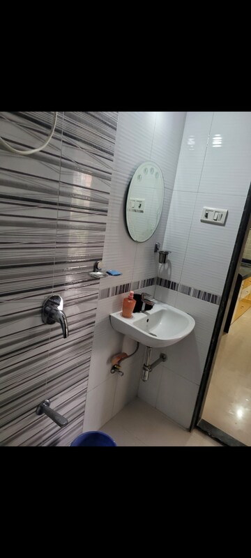 Bathroom in 2 BHK Apartment at Mahavir Kalpavruksha, Ghodbunder Road – for Sale