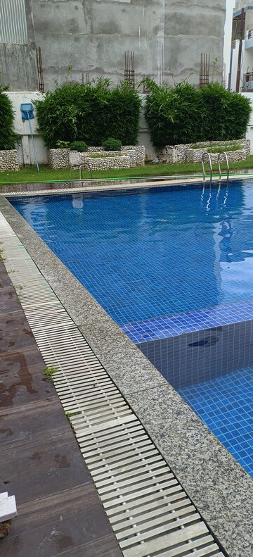 Swimming Pool in 3 BHK Apartment at Omega Orchid Heights, Faizabad Road – for Sale