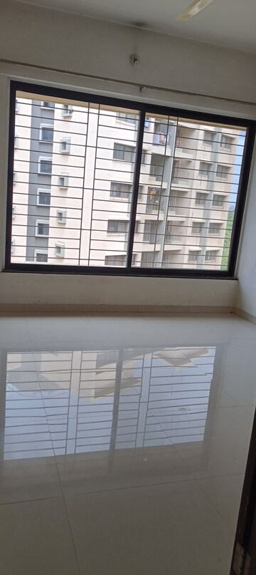 Room in 2 BHK Apartment at Pride World City Long Island, Charholi Budruk – for Sale