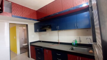 Kitchen in 2 BHK Apartment at Cosmos Jewels, Ghodbunder Road – for Sale