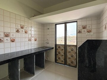 Kitchen in 1 BHK Apartment at Marvel Heights, Vasai East – for Sale