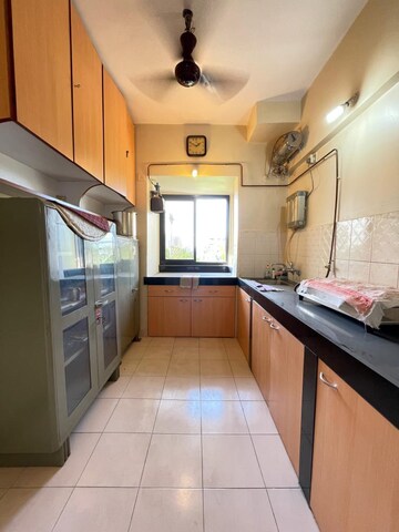 Kitchen in 2 BHK Apartment at Lokhandwala Riviera Tower, Kandivali East – for Sale
