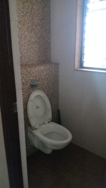 Bathroom in 1 BHK Apartment at Lodha Lakeshore Greens, Dombivli East – for Sale