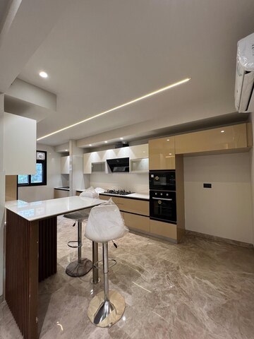 Kitchen in 4 BHK Builder Floor at Ansal Sushant Lok I, Sector 43 – for Sale