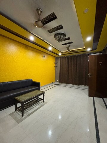 Living Room in 2 BHK Apartment at Dhakoli Village – for Sale