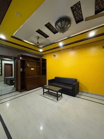 Living Room in 2 BHK Apartment at Dhakoli Village – for Sale
