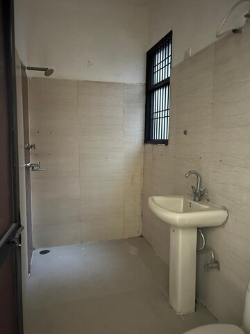 Bathroom in 3 BHK Apartment at Dhakoli Village – for Sale