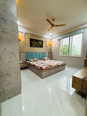 Bedroom in 4 BHK Apartment at Mansarovar Extension – for Sale