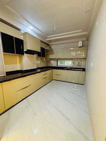 Kitchen in 4 BHK Apartment at Mansarovar Extension – for Sale