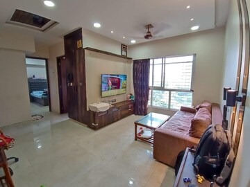 Living Room in 1.5 BHK Apartment at Lodha Amara, Kolshet Road – for Sale