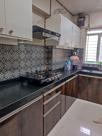 Kitchen in 1.5 BHK Apartment at Lodha Amara, Kolshet Road – for Sale