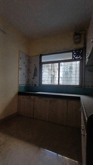 Room in 2 BHK Apartment at Seawoods – for Sale