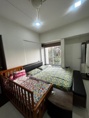 Bedroom in 4 BHK Apartment at Lulla Nagar – for Sale