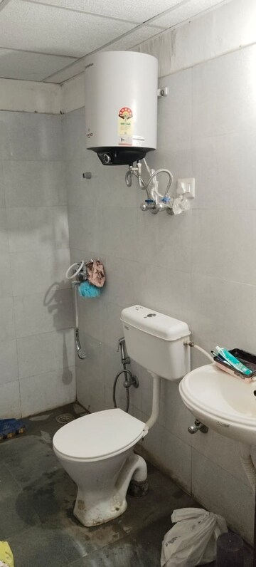 Bathroom in 2 BHK Apartment at Signature Global Orchard Avenue, Sector 93 – for Sale