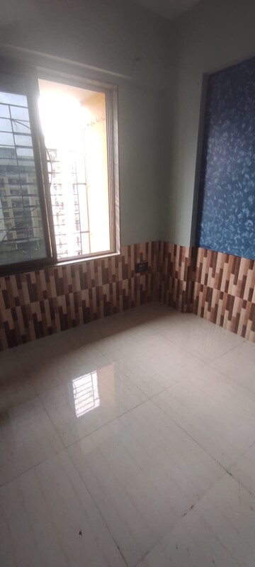Bedroom in 1 BHK Apartment at Swastik Palms CHS, Brahmand – for Sale