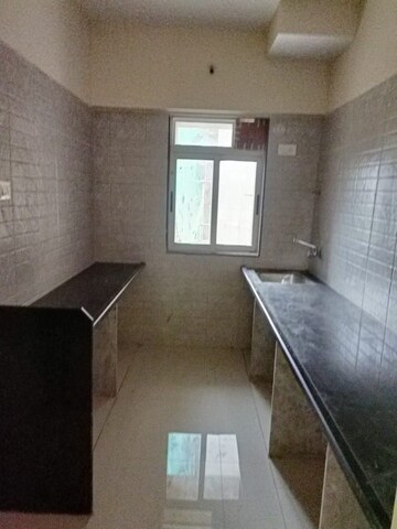 Kitchen in 2 BHK Apartment at Vihang Valley Phase 3, Kasarvadavali – for Sale
