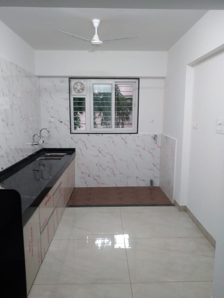 Kitchen, om-sai-chs-old-sanghavi 2 Bedroom 800 Sq.Ft. Apartment In Old Sangvi Pune 7423463