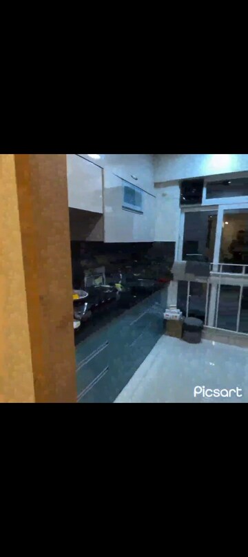 Kitchen in 2 BHK Apartment at Raunak Unnathi Woods, Ghodbunder Road – for Sale