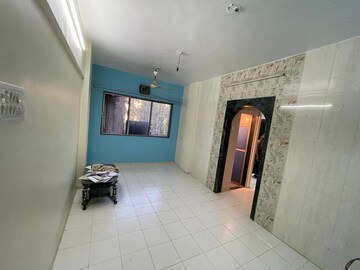 Living Room in 1 BHK Apartment at Raj Shivam Society, Dahisar East – for Sale