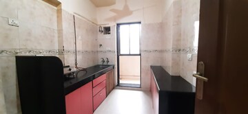 Kitchen in 2 BHK Apartment at K Raheja Heights, Malad East – for Sale
