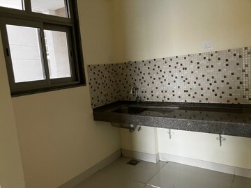 Kitchen in 2 BHK Apartment at Wadhwa TW Gardens, Kandivali East – for Sale