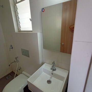 Bathroom in 2 BHK Apartment at Acme Ozone, Manpada – for Sale