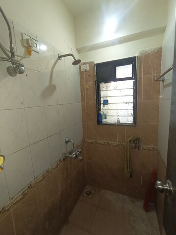 Bathroom in 1.5 BHK Apartment at Mantri Park, Goregaon East – for Sale