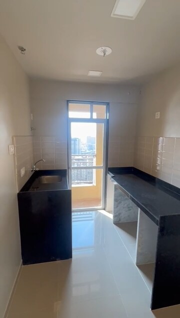 Kitchen in 1 BHK Apartment at JP North Aviva, Mira Road – for Sale