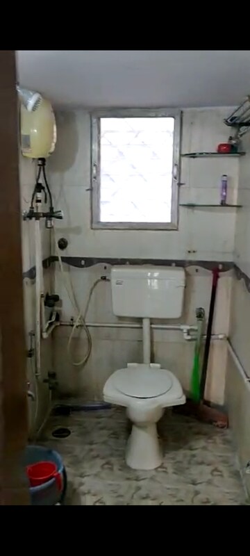 Bathroom in 2.5 BHK Apartment at RNA Corp Courtyard, Mira Road – for Sale