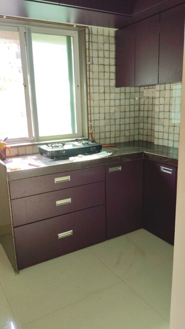 Kitchen in 1 BHK Apartment at Vile Parle West – for Sale