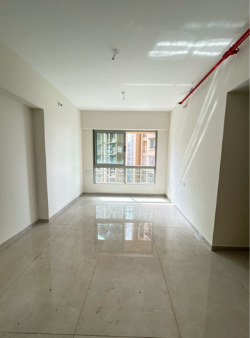 Living Room in 1 BHK Apartment at Gurukrupa Marina Enclave, Jankalyan Nagar – for Sale