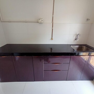 Kitchen in 1.5 BHK Apartment at Rosa Gardenia, Ghodbunder Road – for Sale