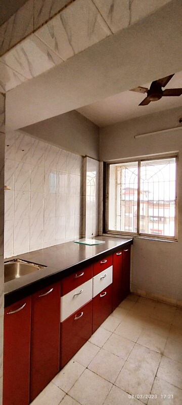 Kitchen in 1 BHK Apartment at Sanghvi Garden, Manpada – for Sale