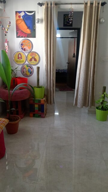 Living Room in 1 BHK Apartment at Lodha Downtown, Dombivli East – for Sale