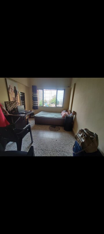 Living Room in 1 BHK Apartment at Gautam CHS, Borivali East – for Sale
