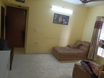 Living Room in 1 BHK Apartment at Lodha Amara, Kolshet Road – for Sale
