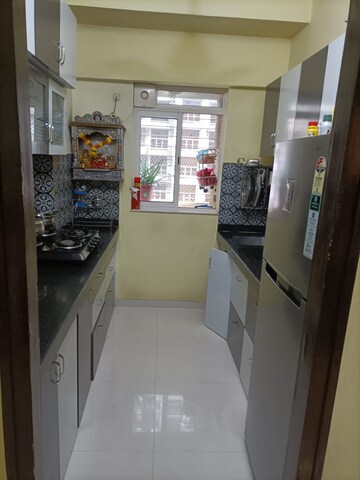 Kitchen in 1 BHK Apartment at Lodha Amara, Kolshet Road – for Sale