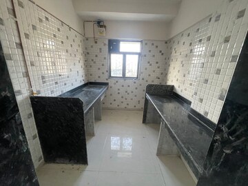 Kitchen in 1 BHK Apartment at Harshal Devchhaya, Dahisar East – for Sale