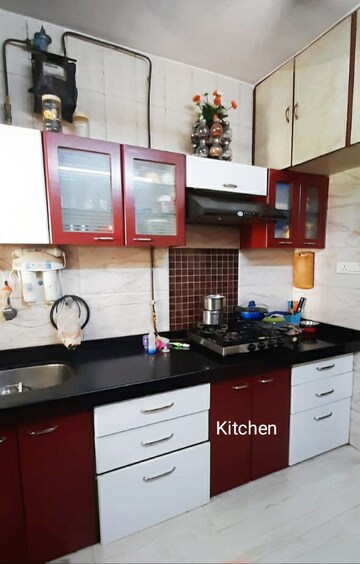 Kitchen in 2 BHK Apartment at Cirrus CHSL Cosmos Paradise, Vasant Vihar – for Sale
