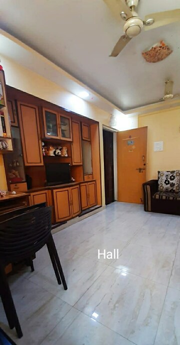 Living Room in 2 BHK Apartment at Cirrus CHSL Cosmos Paradise, Vasant Vihar – for Sale