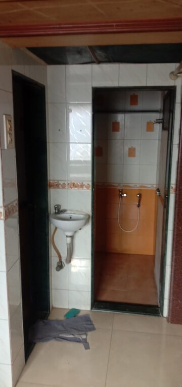 Bathroom in 1 BHK Apartment at Cirrus CHSL Cosmos Paradise, Vasant Vihar – for Sale