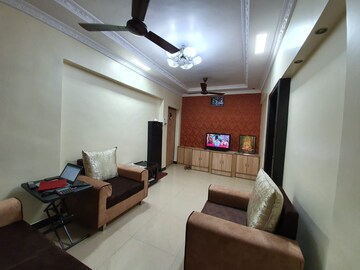 Living Room in 1 BHK Apartment at Cirrus CHSL Cosmos Paradise, Vasant Vihar – for Sale